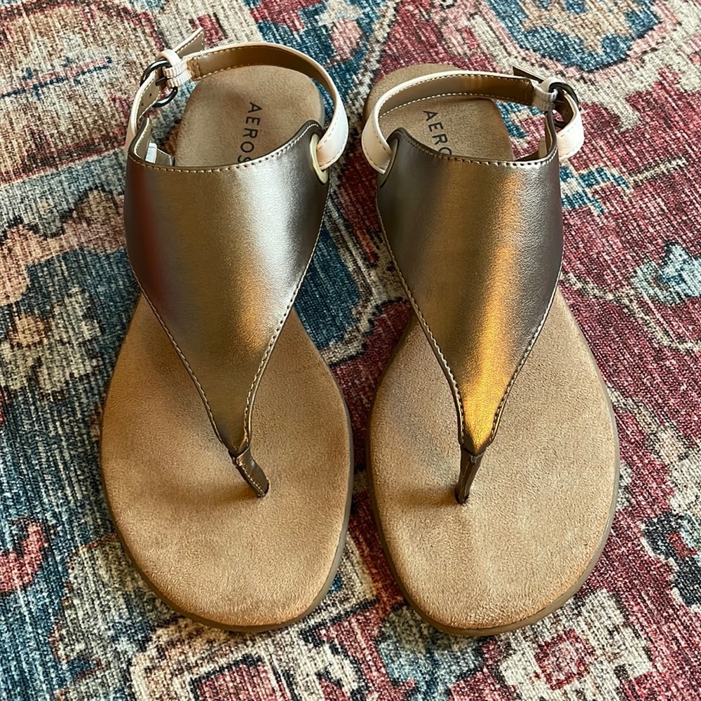 Aerosols gold and white sandals. Size 8.5